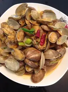 Curry popping clams