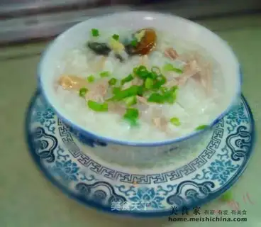 Congee with preserved egg and shredded pork