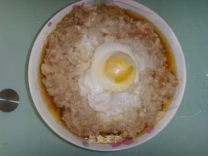Steamed pork loaf with salted eggs and squid