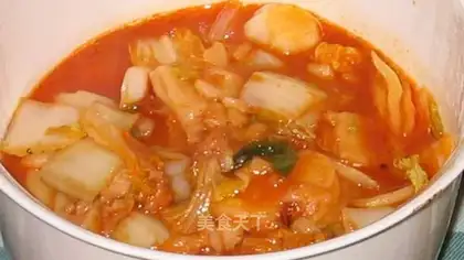 Fried rice cake with Korean spicy cabbage