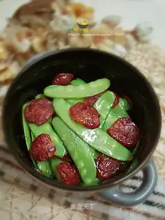 fried sausage with peas