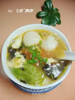 Fish and tomato violet soup