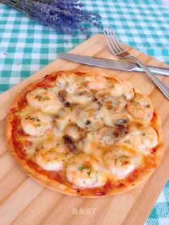 A thin seafood pizza