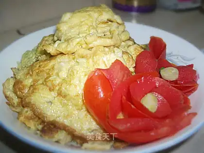 Fried eggs with leek flowers