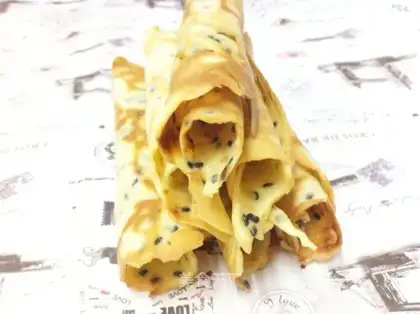 Black sesame egg rolls