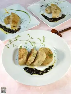 Two white rolls of sauce