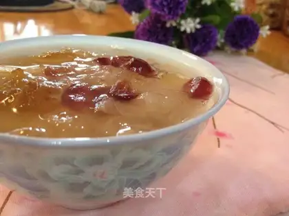 Cranberry berries and silver spoons