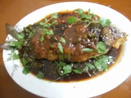 Roasted dried crucian carp in sauce
