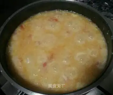 Duck egg and tomato soup