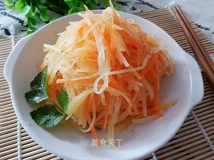 A carrot with potatoes