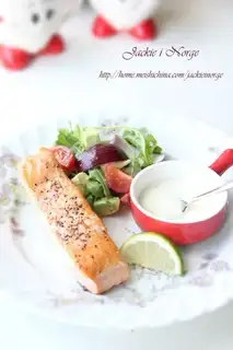 The salmon with the butter and the salad