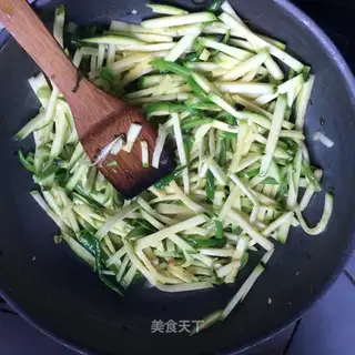Cleaning up the green pumpkins