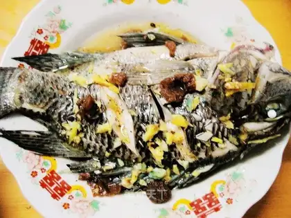 Steamed fish with plums