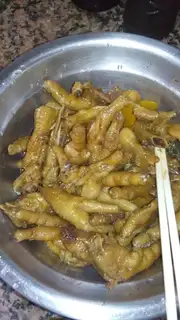 The feet of a halogened chicken
