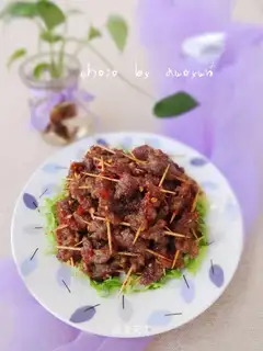 Spicy toothpick beef