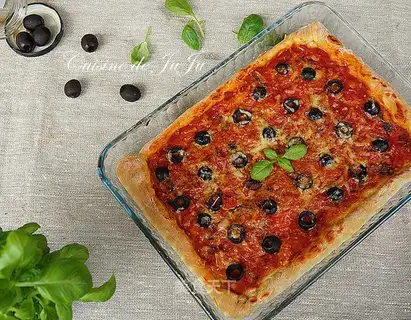 Homemade tomato olive pizza
