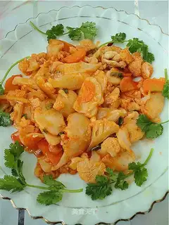 stir-fried rice cake with tomato sauce