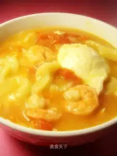 Fish soup with tomato and shrimp noodles