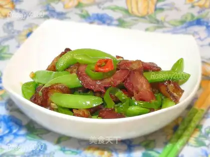 Pork elbow fried sweet peas