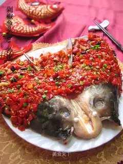 Delicious fish head with chopped pepper