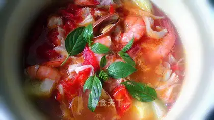 Tomato potatoes and seafood soup