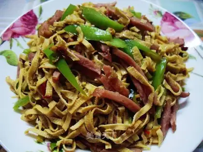 stir-fried shredded duck with dried tofu