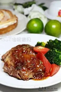 Red wine pork chop with plum blossom