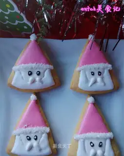 Santa's frosting cookies