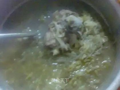 Stewed pickled cabbage with big bones