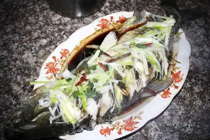 Fresh fish with onions