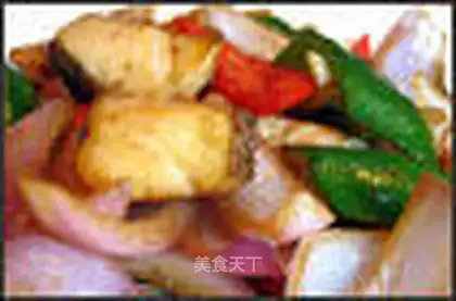 Baked silver cod with onions and peppers