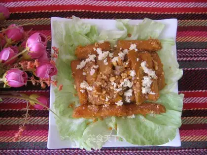 Baked pumpkin strips with salty egg yolk
