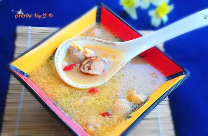 Tasty chicken soup with pinewood