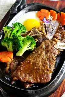 Iron-plated black bubbly steak