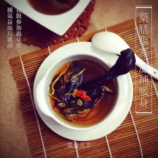 A chicken soup with a moth