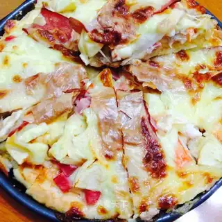 Tuna apple shrimp pizza