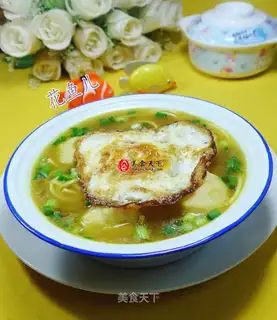 Eggs, ink, curry noodles