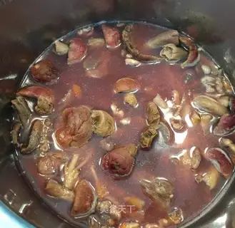 Red mushroom edible bone soup
