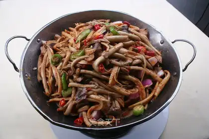 A pot of tea and mushrooms