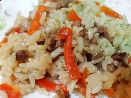 The lamb's hand grabs rice