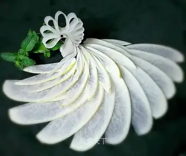 Peacock on white carrots