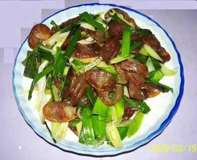 stir-fried sausage with garlic sprouts
