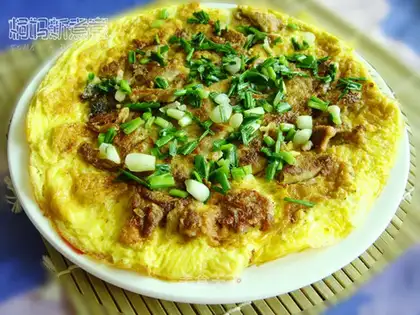 Fried eggs with fish sausage