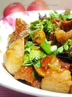 Roasted arrowhead with pork belly