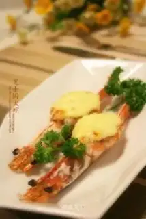 A condensed car with cheese sauce and shrimp