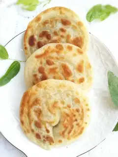 An egg box with a pickle