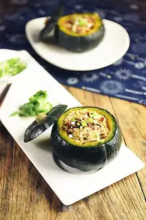 An organic pumpkin, a melon