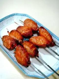 Skewer roasted crispy chicken wings
