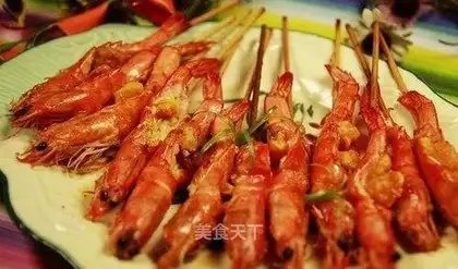 Shrimp skewers with egg yolk