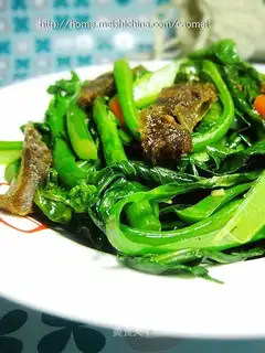 stir-fried sausage with kale